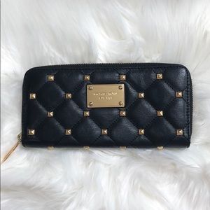 Black leather Michael Kors wallet with gold studs